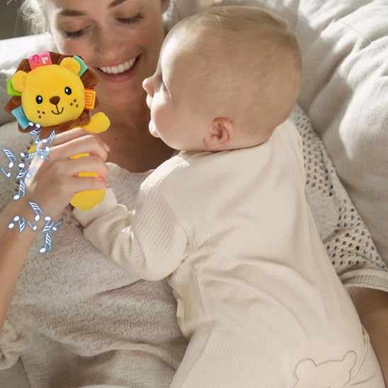 Hochet bebe lion content