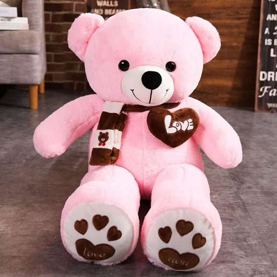 Ours en peluche rose bonbon