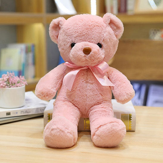Ours en peluche rose clair