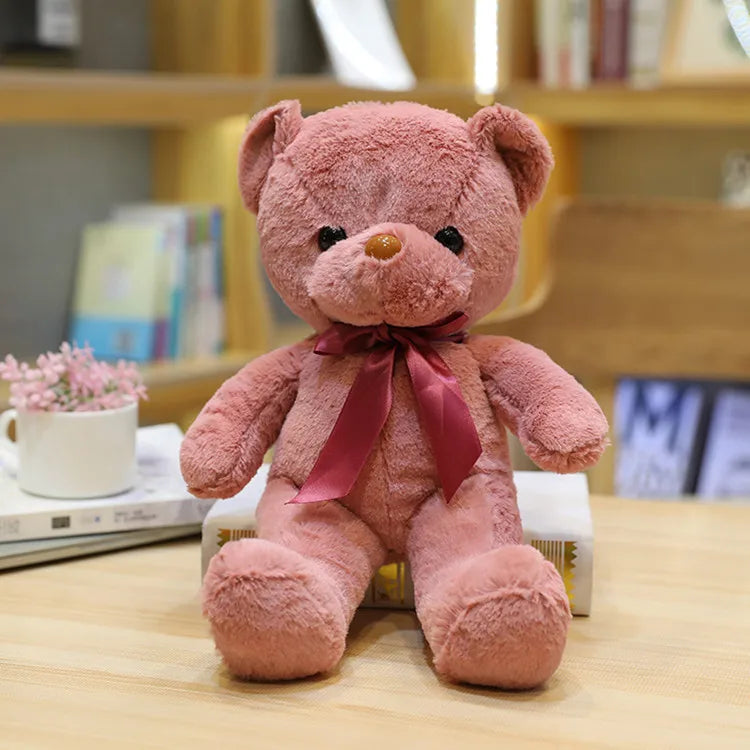 Ours en peluche rose fonce