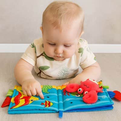 Livre bebe en tissus poisson relief