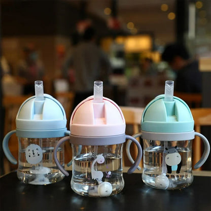 Tasse d'apprentissage bleu rose vert