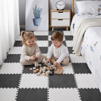 Tapis mousse puzzle gris blanc