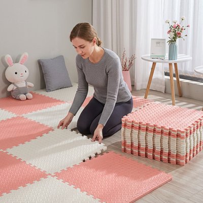 Tapis mousse puzzle rose blanc